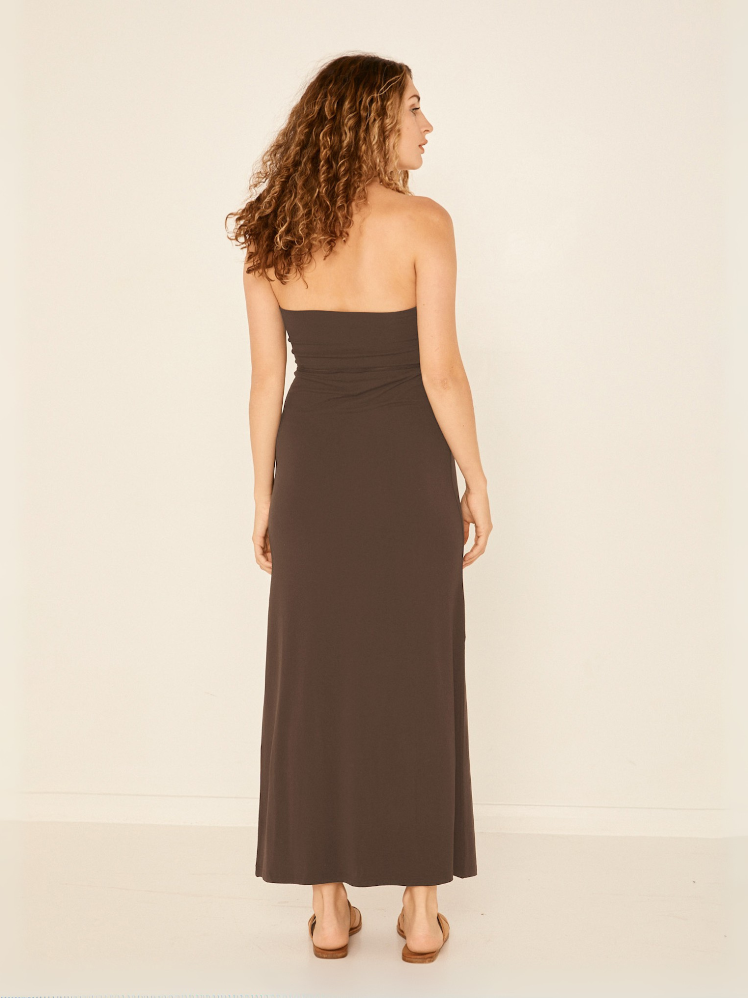 model wearing a long cocoa brown maxi length skirt worn as a strapless dress, women's bamboo clothing