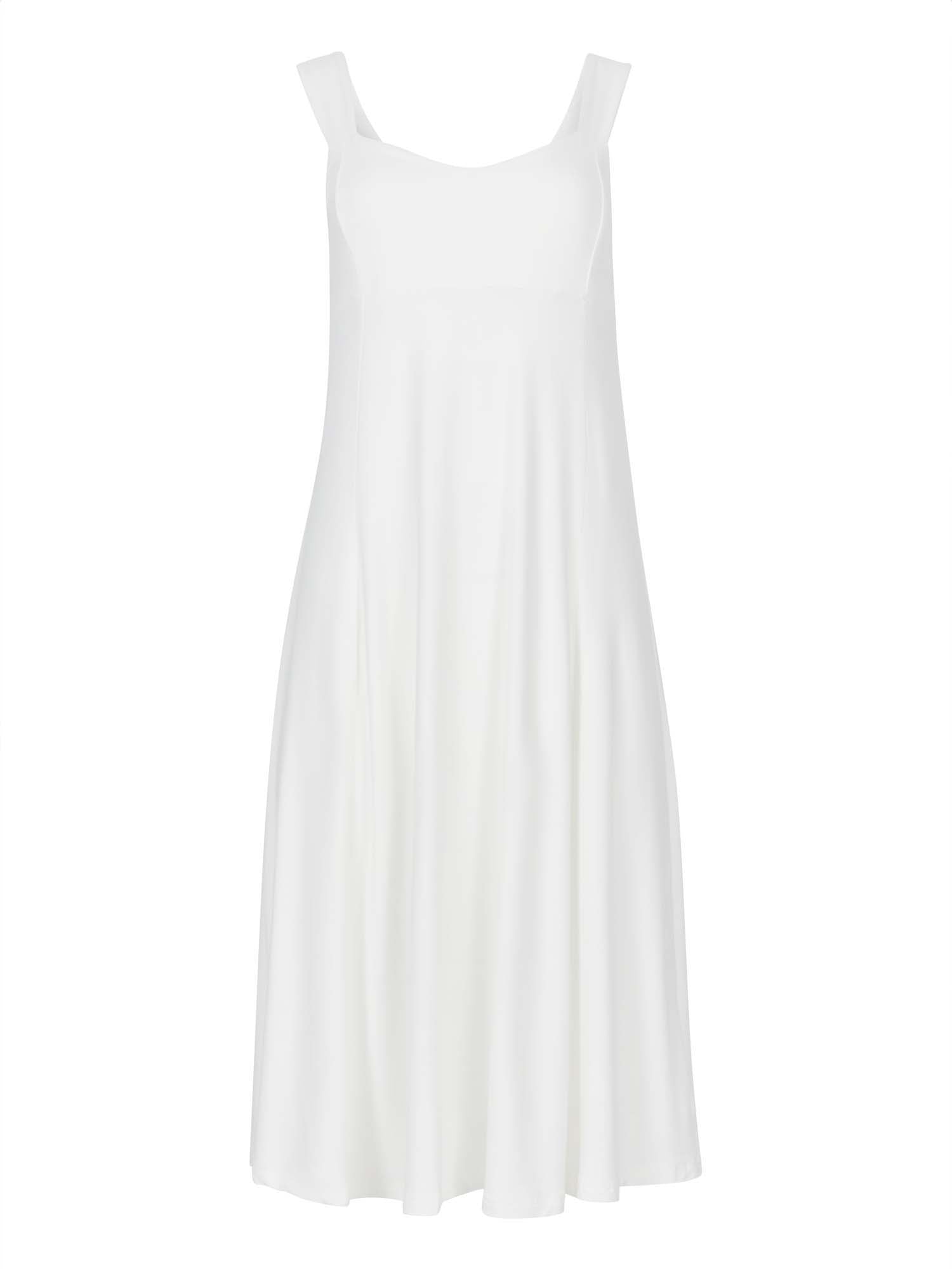 Model wearing a cream mid length, sweetheart neckline swing style dress, women's bamboo clothing
