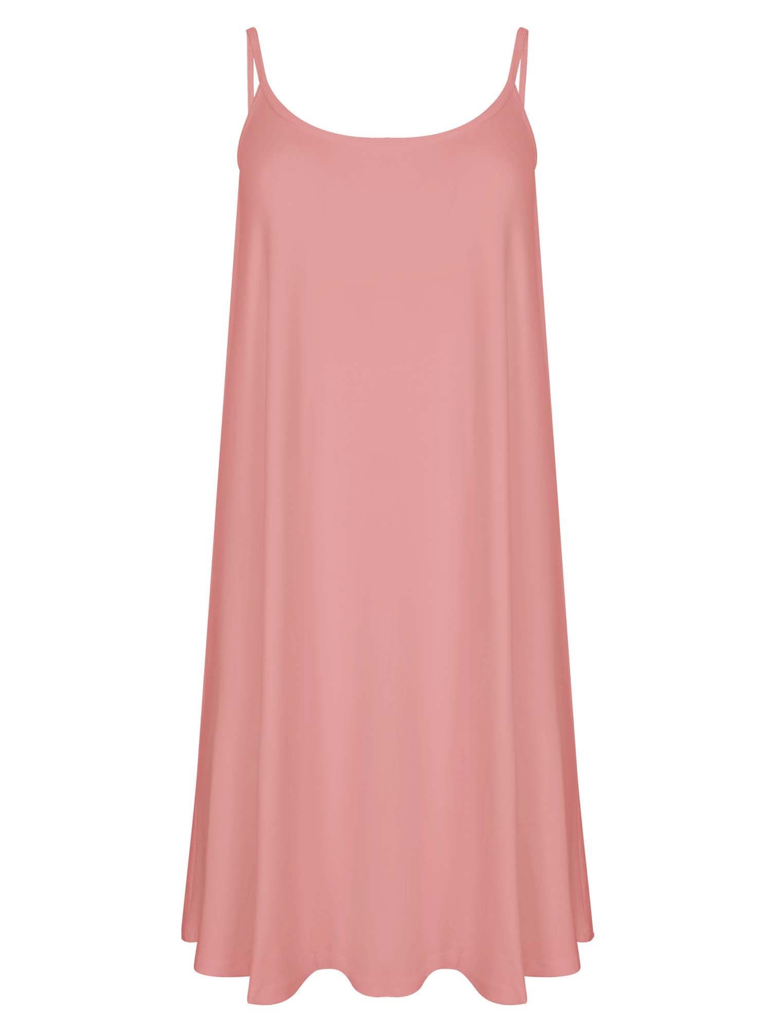 Model wearing a pink knee length swing style dress with a scoop neck and elasticated camisole straps, women's bamboo clothing