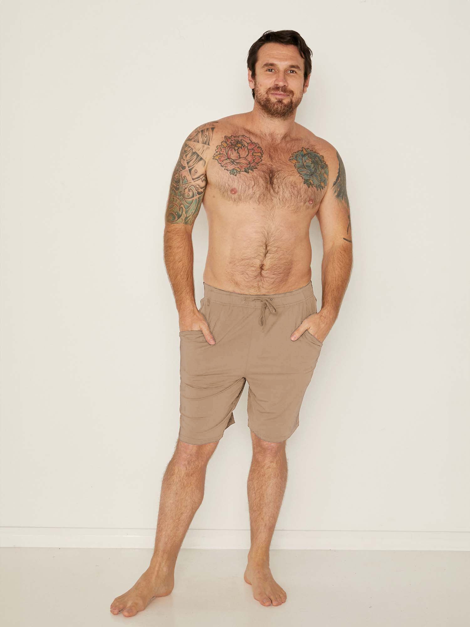Male model wears Bamboo Casual Shorts in Caramel