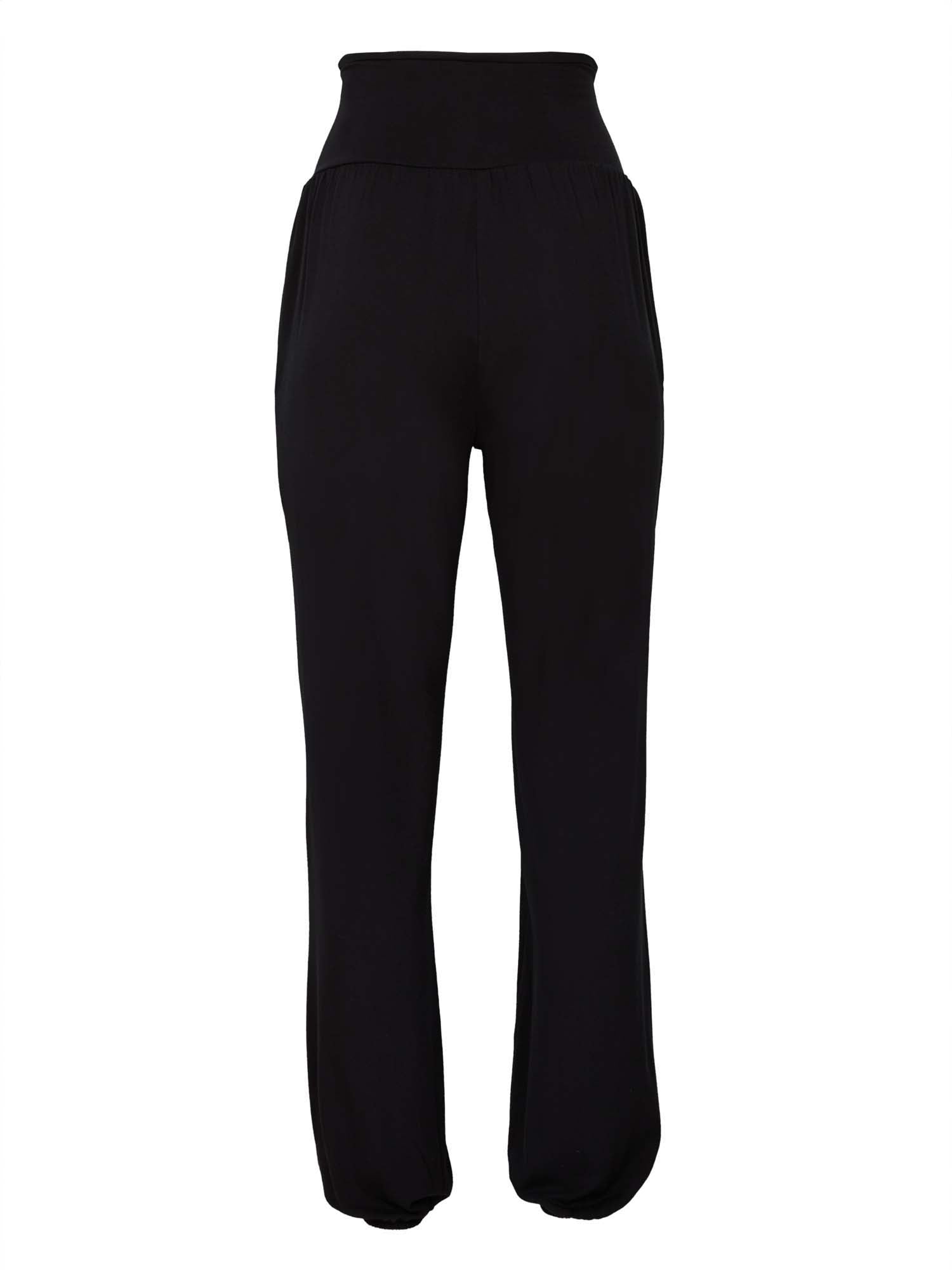 Model wearing black lounge pants with a deep waistband, long relaxed leg, elasticised cuff and side pockets, women's bamboo clothing