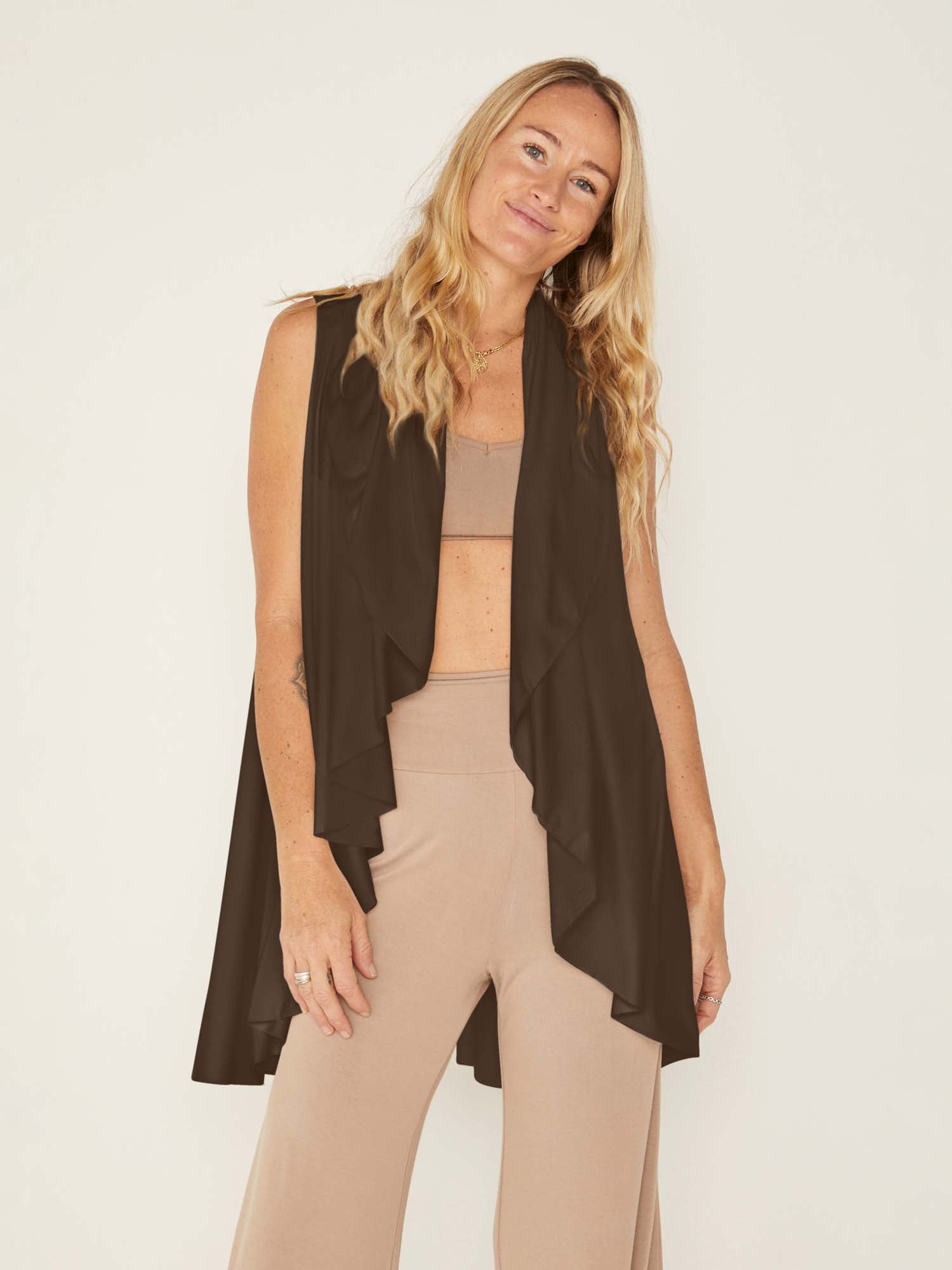 Model wearing a caramel brown convertible style goddess wrap; long cardi, vest or poncho, women's bamboo clothing