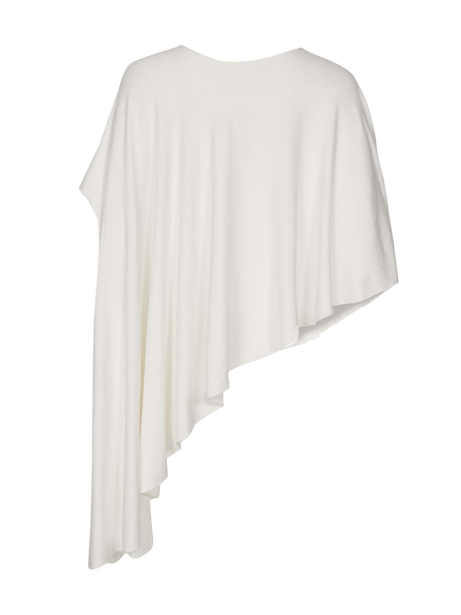 Model wearing a cream convertible style goddess wrap; long cardi, vest or poncho, women's bamboo clothing