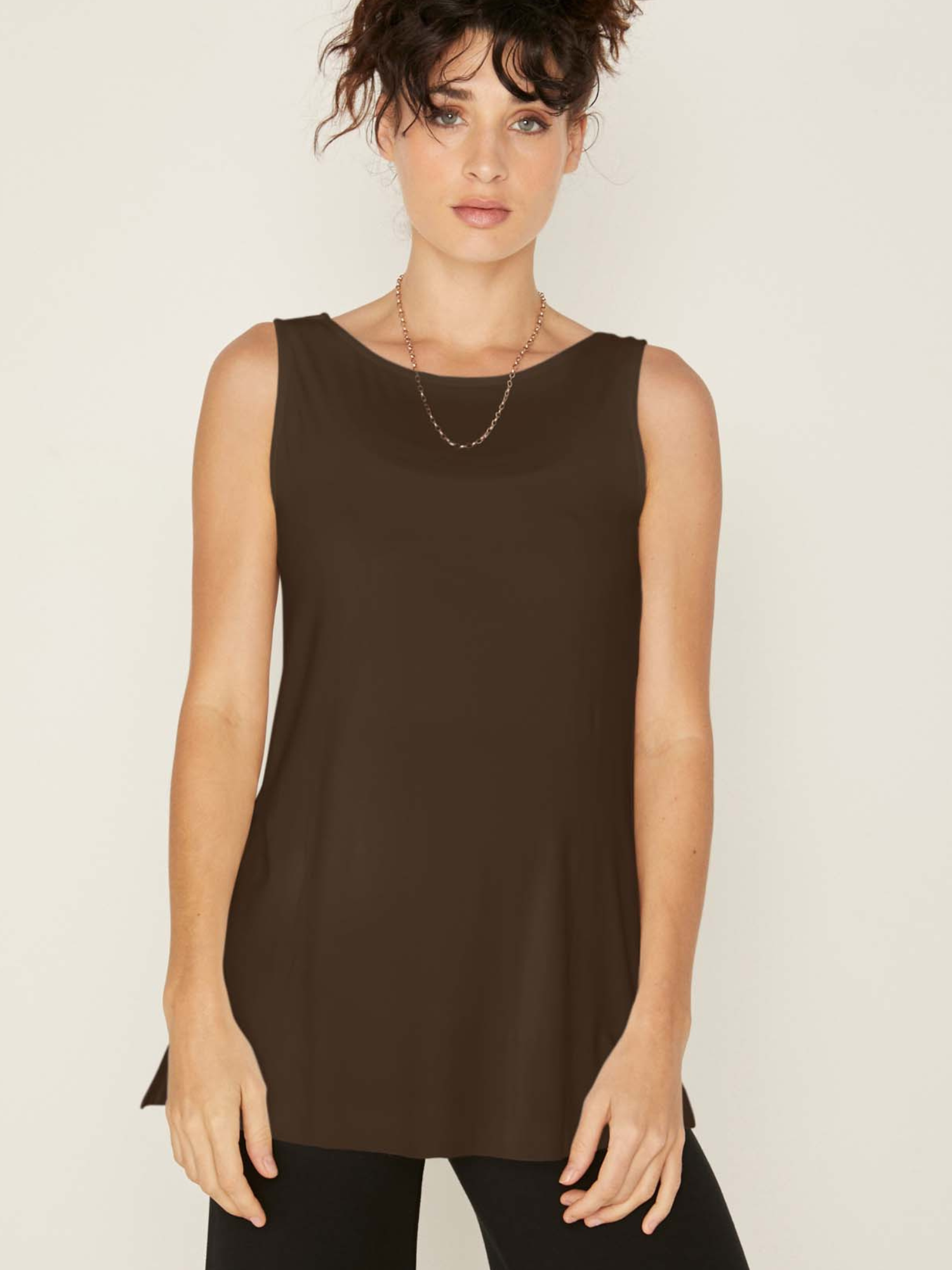 Model wearing a reversible cocoa brown a-line singlet with scoop and boat necklines and long line body, women's bamboo clothing