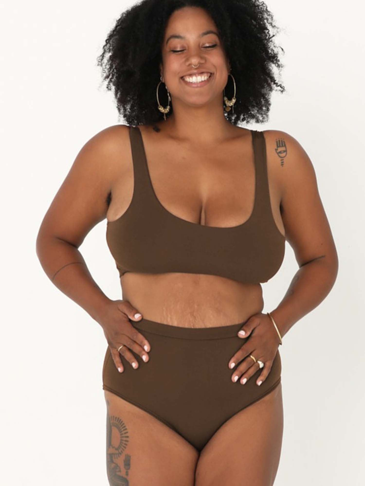 Model wearing cocoa brown high waisted full brief with mid leg opening and double layered waistband, women's bamboo underwear