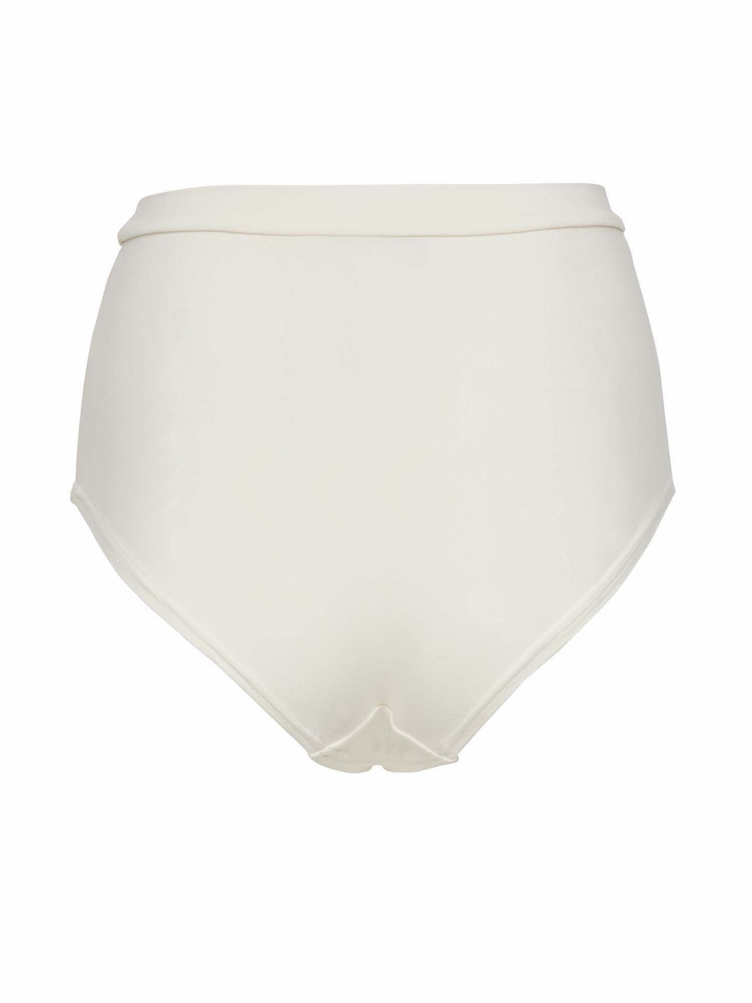 Model wearing cream high waisted full brief with mid leg opening and double layered waistband, women's bamboo underwear