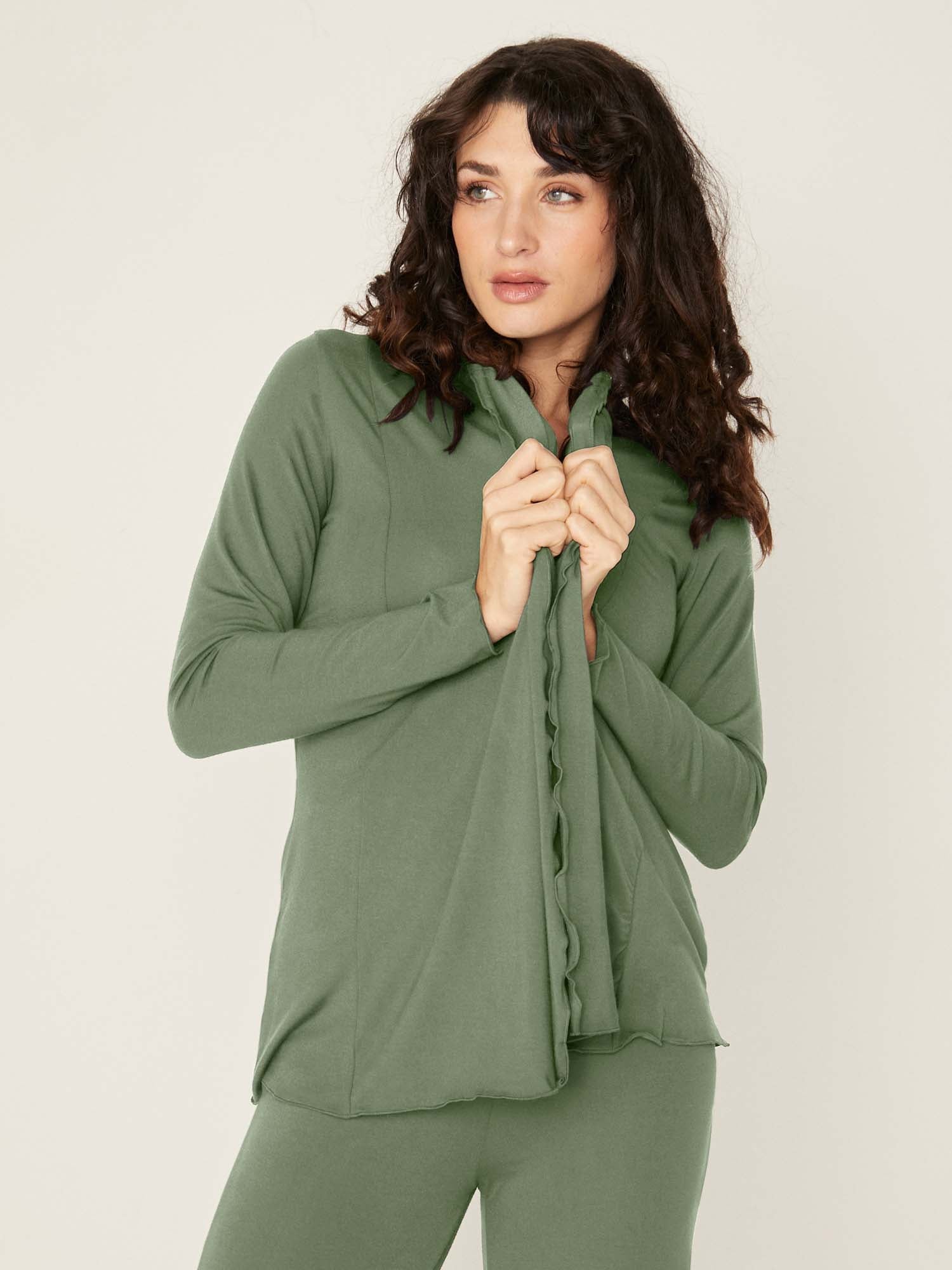 Model wearing convertible eucalyptus green mid cardigan, worn tied at front or worn open with long fitted sleeves, women's bamboo clothing