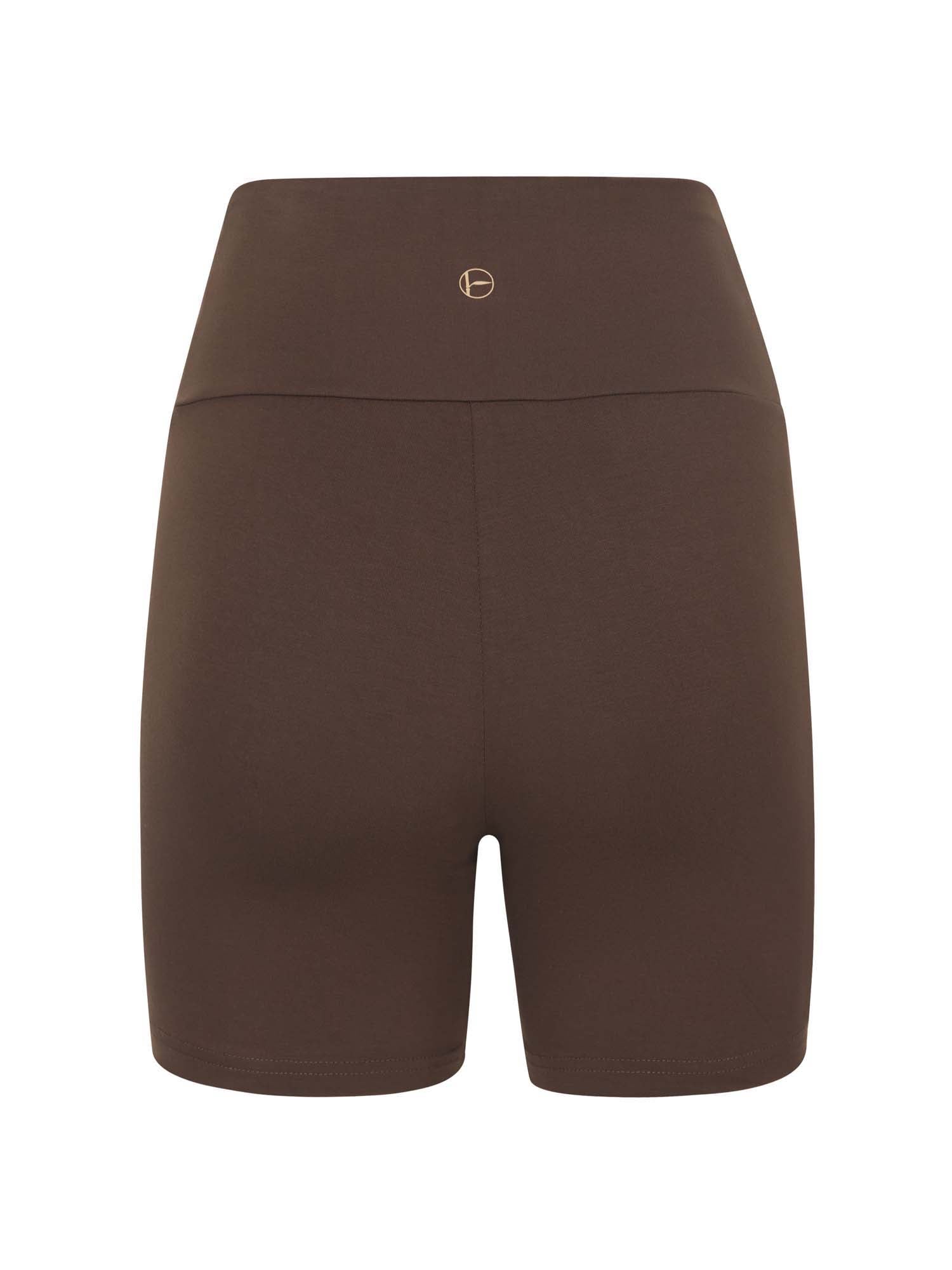 Model wearing cocoa brown mid thigh length sporty shorts with adjustable high waistband, women's bamboo clothing