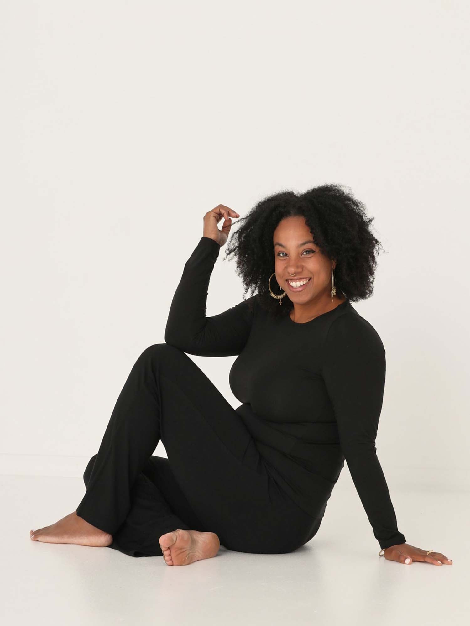 Model wearing black full length straight leg pants, double layered adjustible/high waistband, classic cut, women's bamboo clothing
