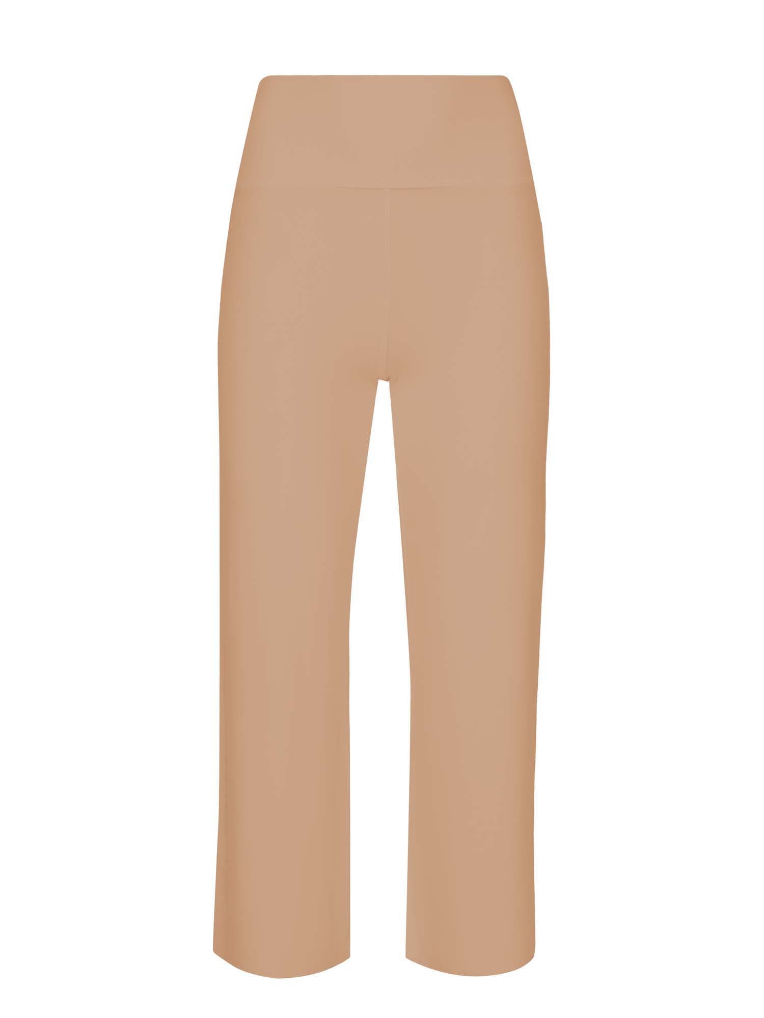 Model wearing caramel 7/8 length resort pants, double layered adjustible high waistband, classic design, women's bamboo clothing