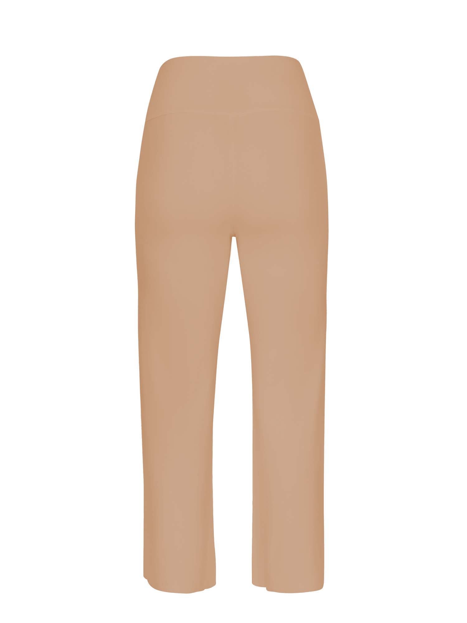 Model wearing caramel 7/8 length resort pants, double layered adjustible high waistband, classic design, women's bamboo clothing