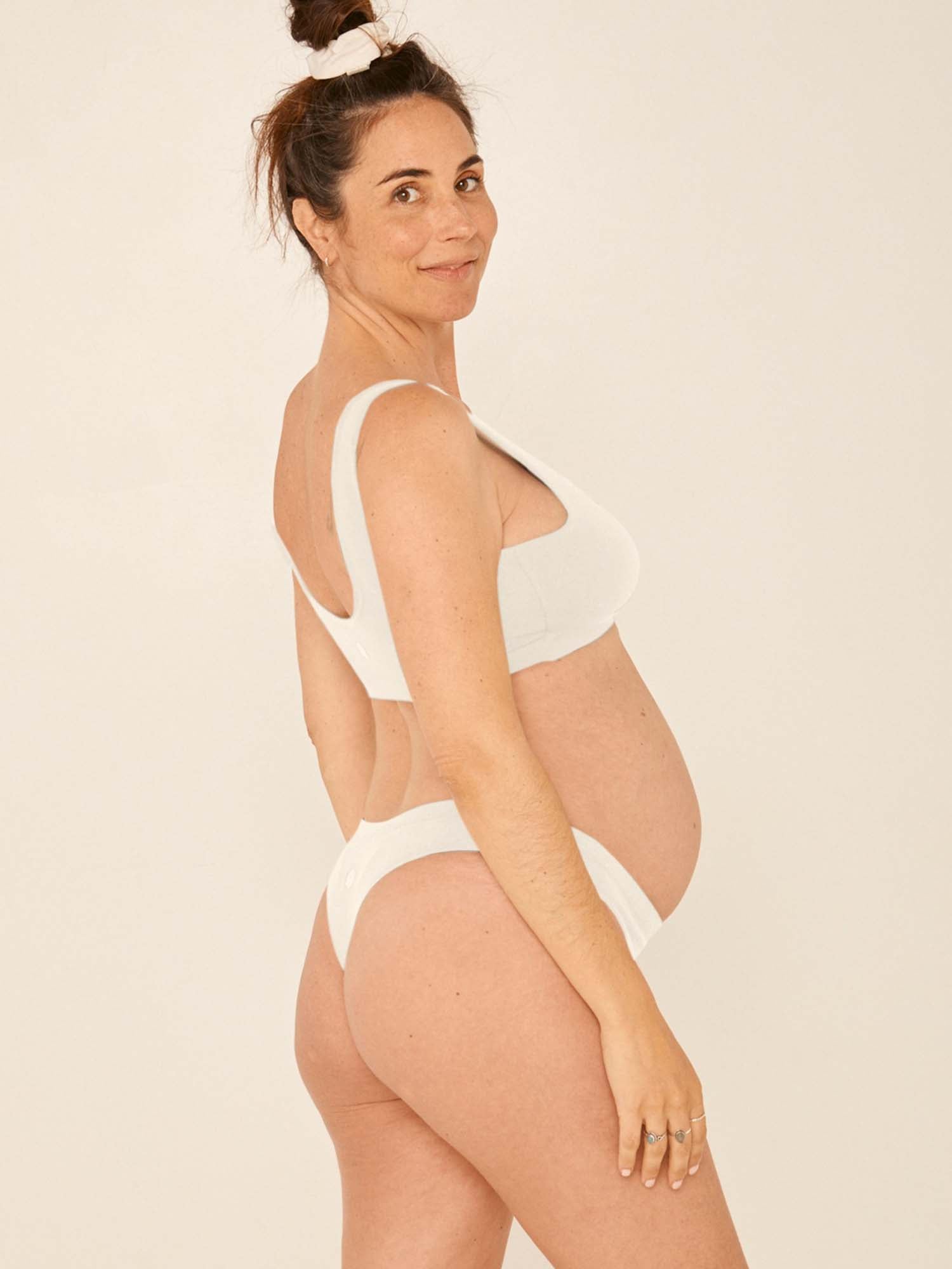 model wearing cream hip g-string, mid waist, thong back, fuller coverage g-string, women's bamboo underwear