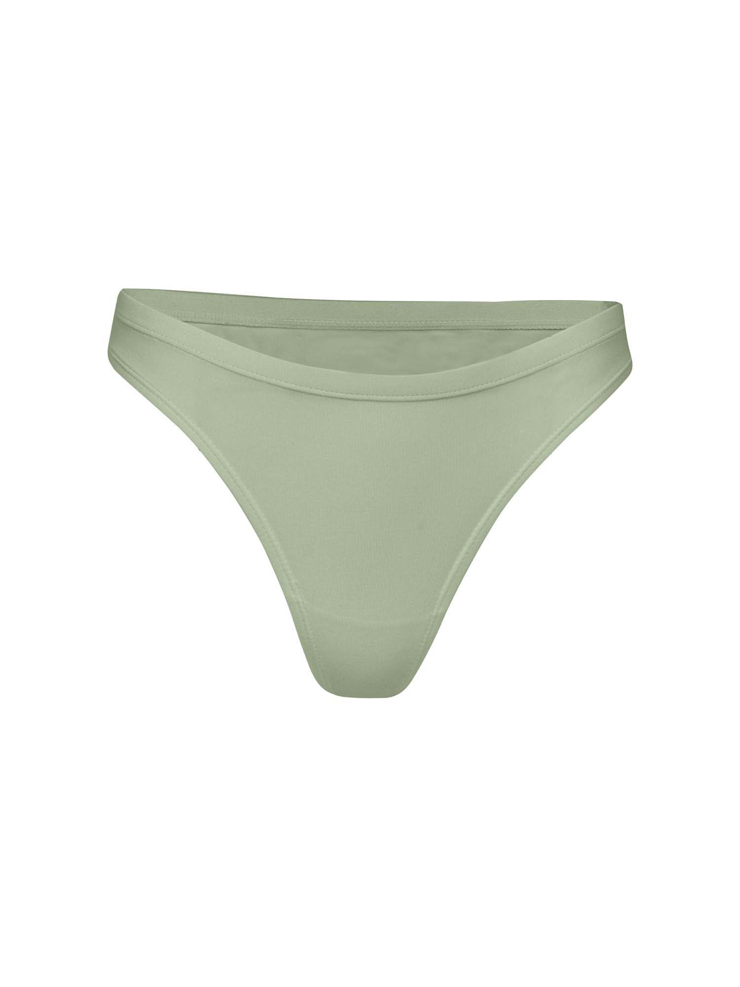 model wearing eucalyptus green hip g-string, mid waist, thong back, fuller coverage g-string, women's bamboo underwear