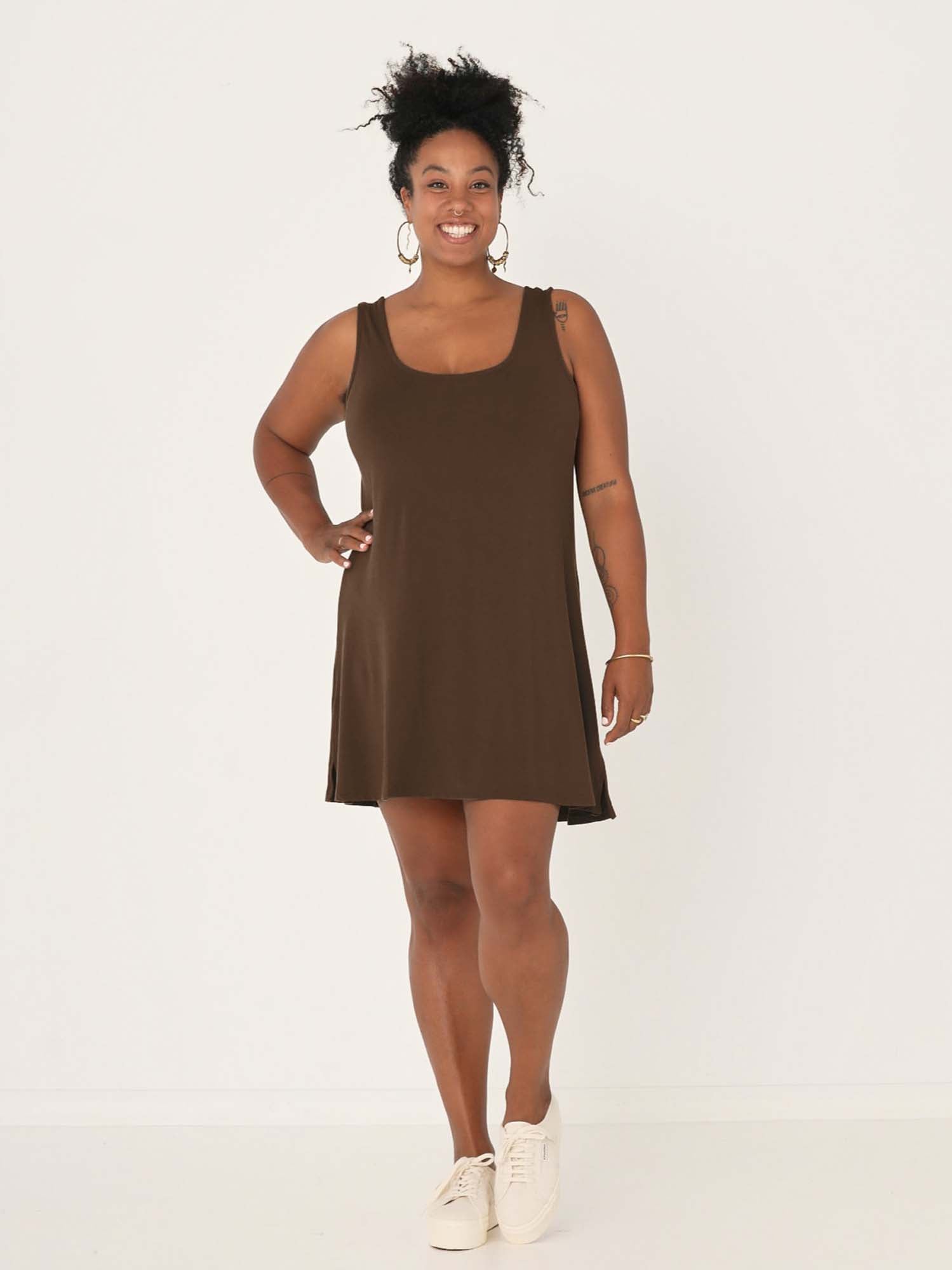 model wearing a cocoa reversible sleeveless tunic with scoop and boat necklines, a-line shape, mini length, women's bamboo clothing