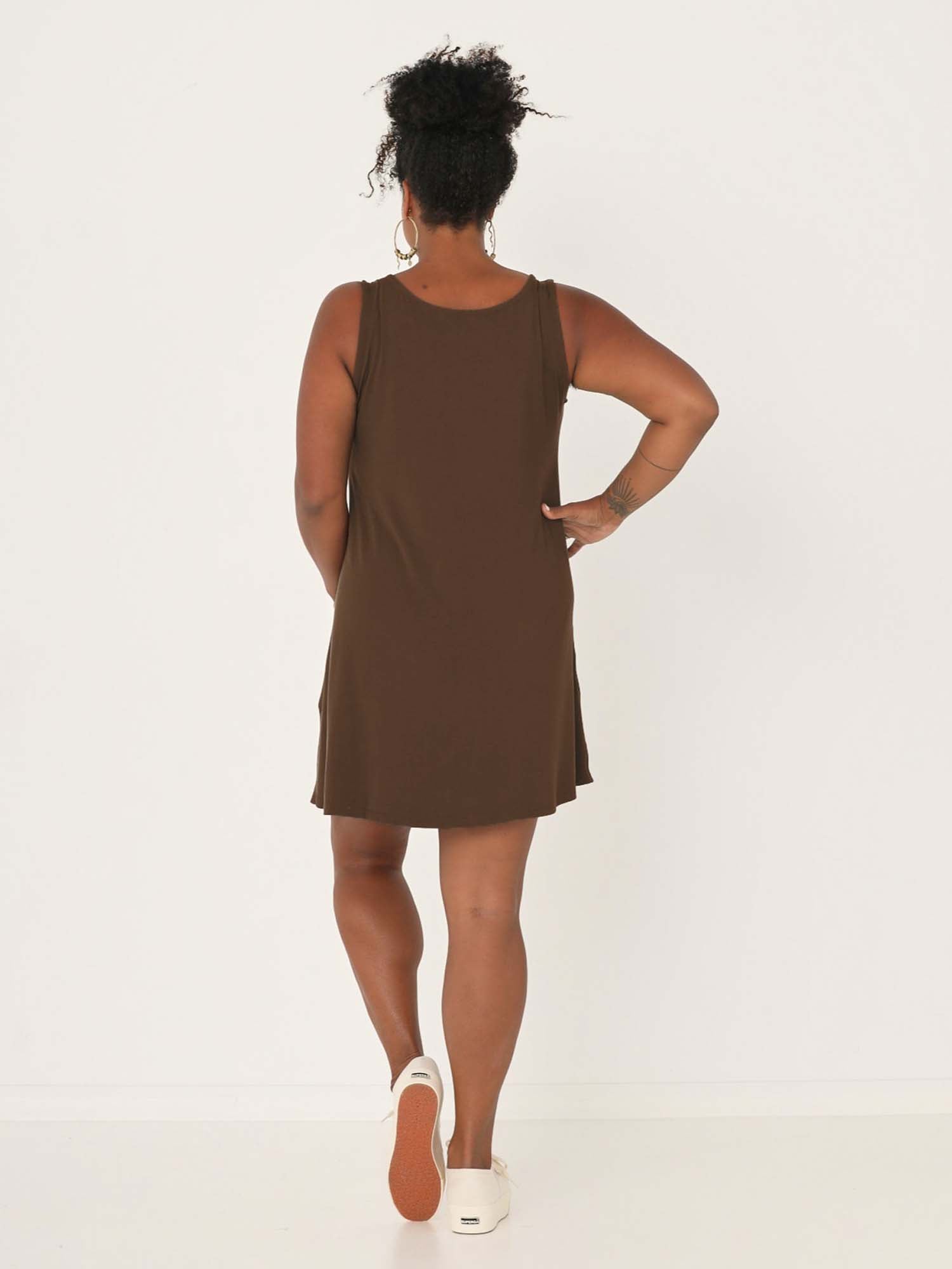 model wearing a cocoa reversible sleeveless tunic with scoop and boat necklines, a-line shape, mini length, women's bamboo clothing