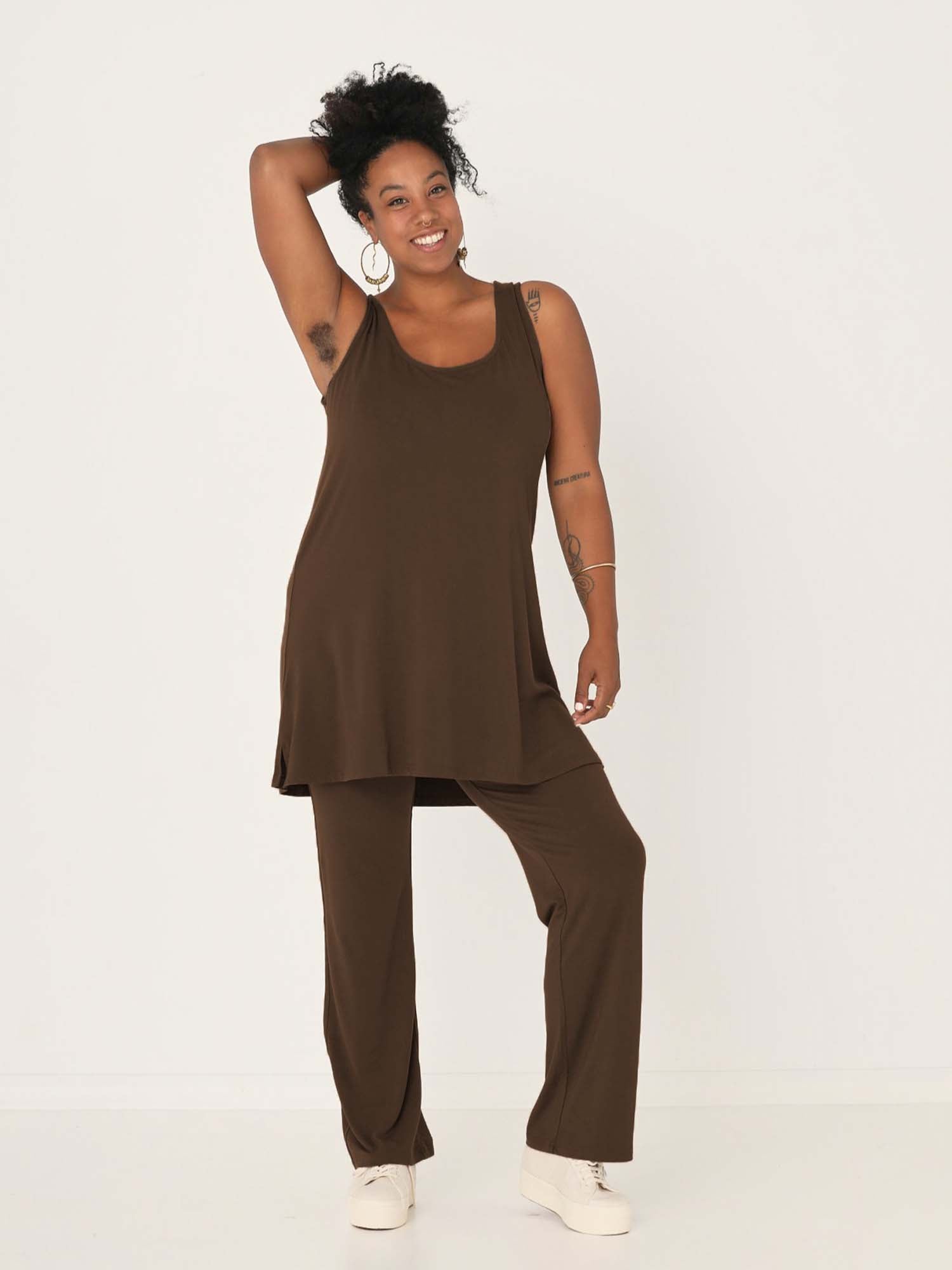 model wearing a cocoa reversible sleeveless tunic with scoop and boat necklines, a-line shape, mini length, women's bamboo clothing