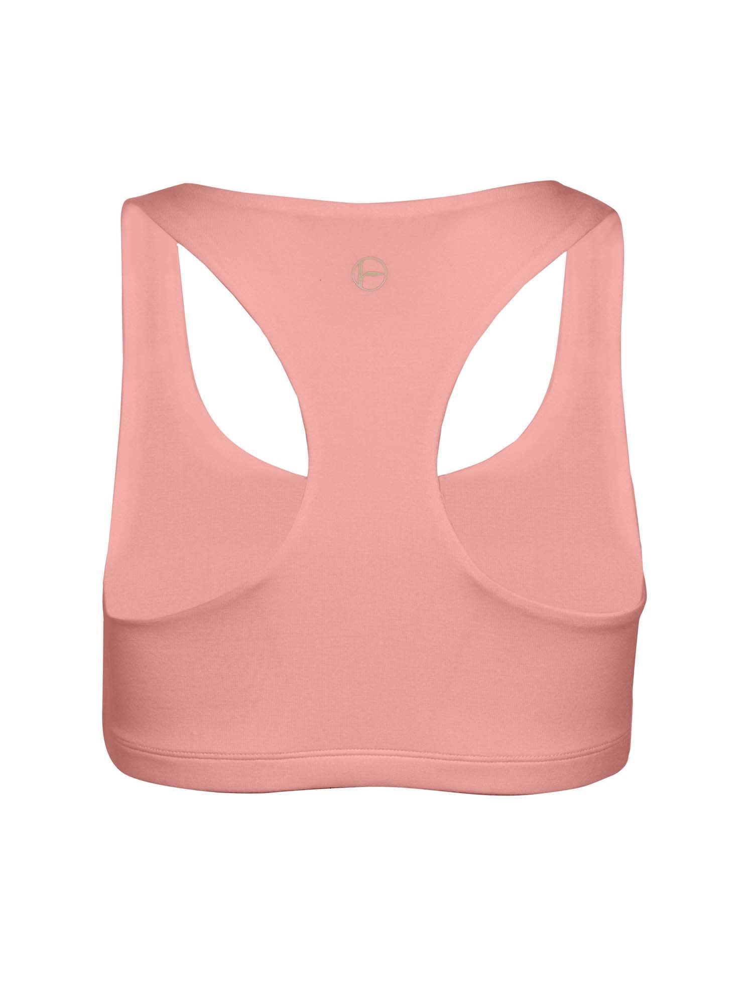 Model wearing a pink racer back bra with double layered fabric, sports bra, wireless bra, women's bamboo underwear