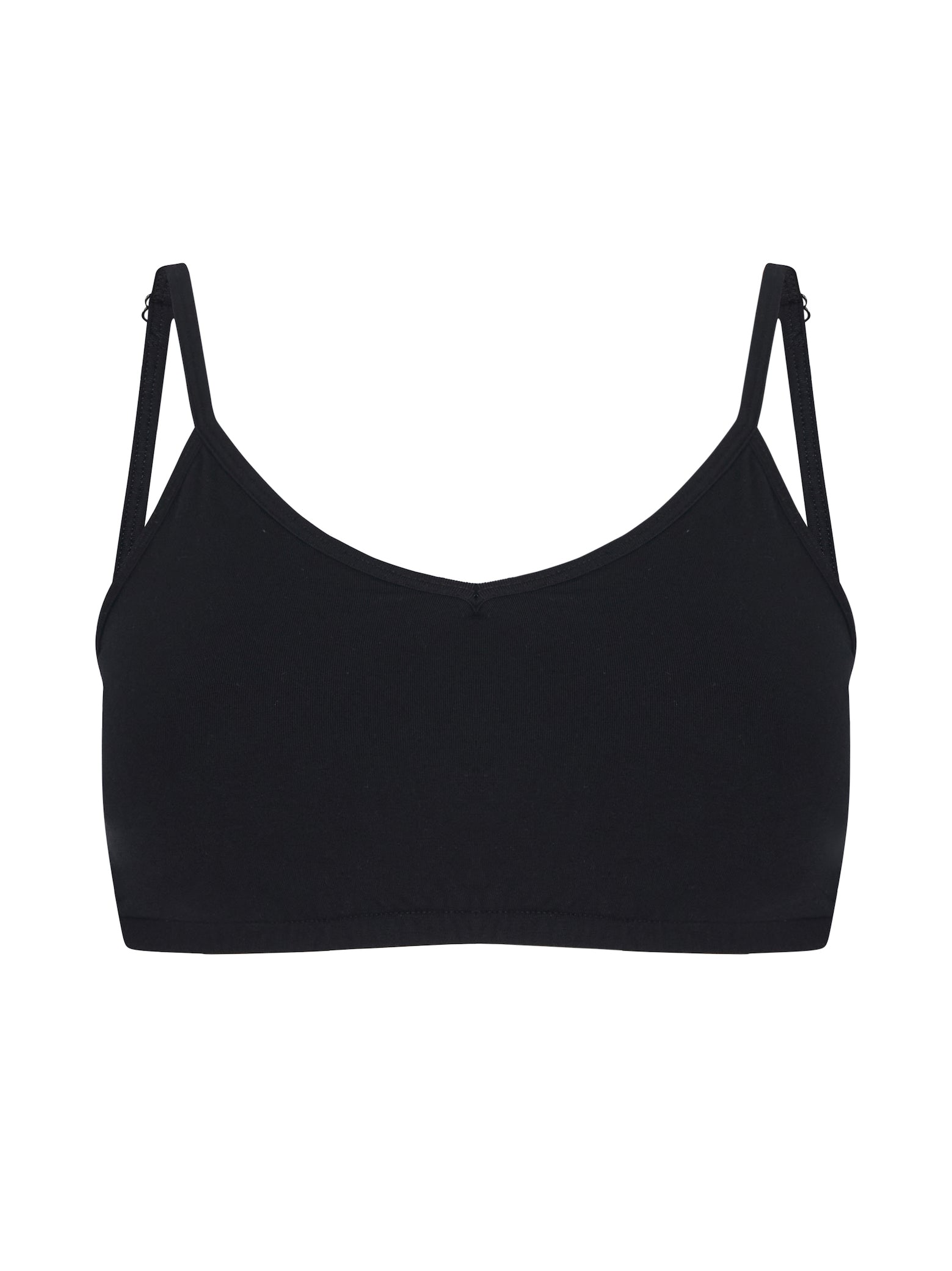 Model wearing a black wireless yoga bra, subtle v front, soft cup bralette with adjustable camisole straps, women's bamboo underwear