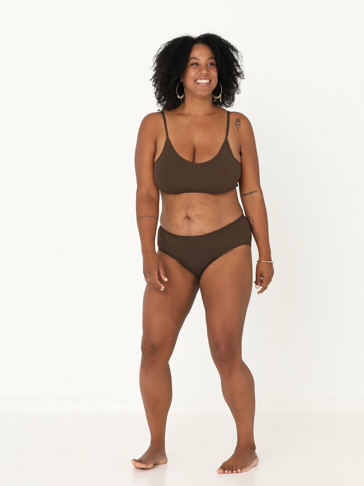 Model wearing a cocoa wireless yoga bra, subtle v front, soft cup bralette with adjustable camisole straps, women's bamboo underwear