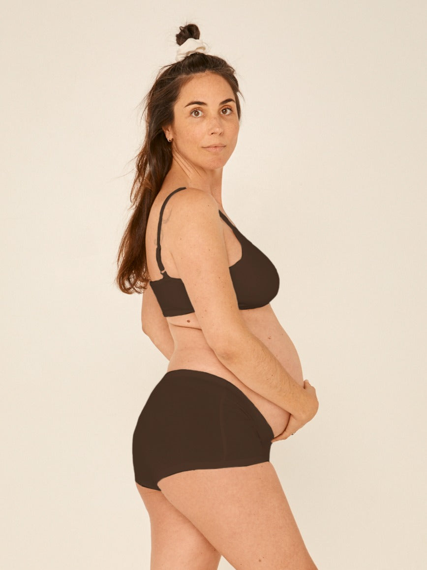 Model wearing a cocoa wireless yoga bra, subtle v front, soft cup bralette with adjustable camisole straps, women's bamboo underwear