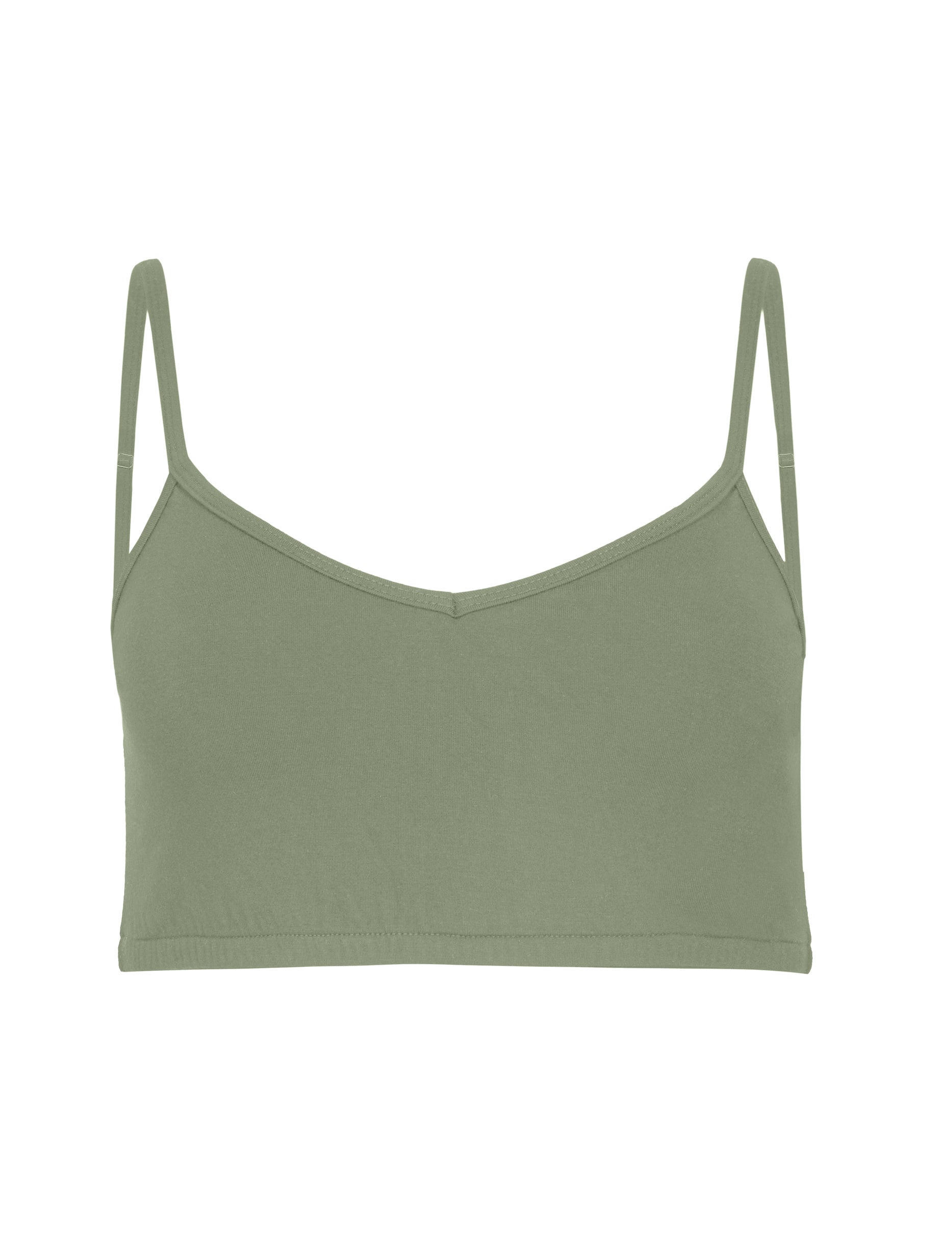 Model wearing a eucalyptus green, wireless yoga bra, subtle v front, soft cup bralette with adjustable camisole straps, women's bamboo underwear