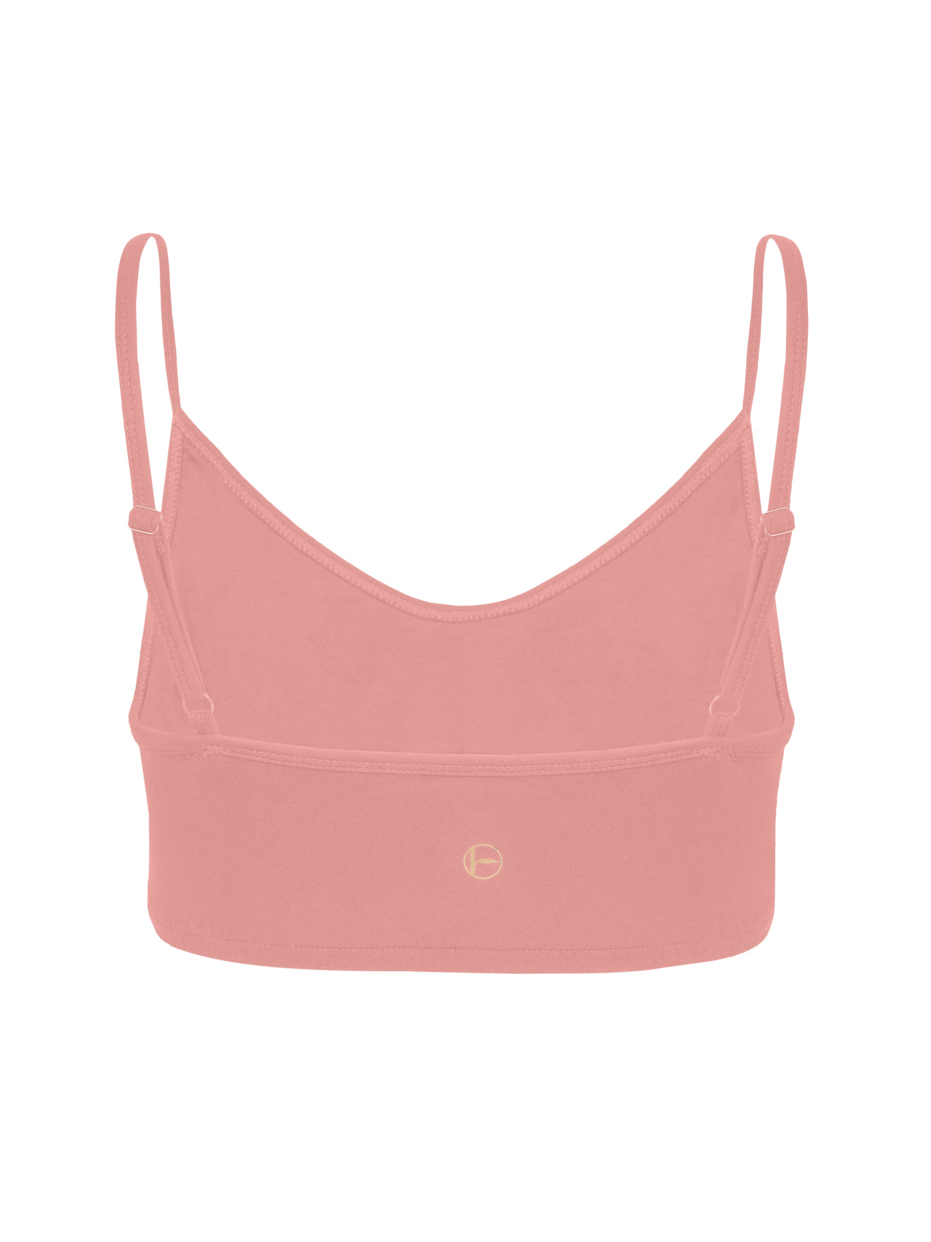 Model wearing a pink, wireless yoga bra, subtle v front, soft cup bralette with adjustable camisole straps, women's bamboo underwear