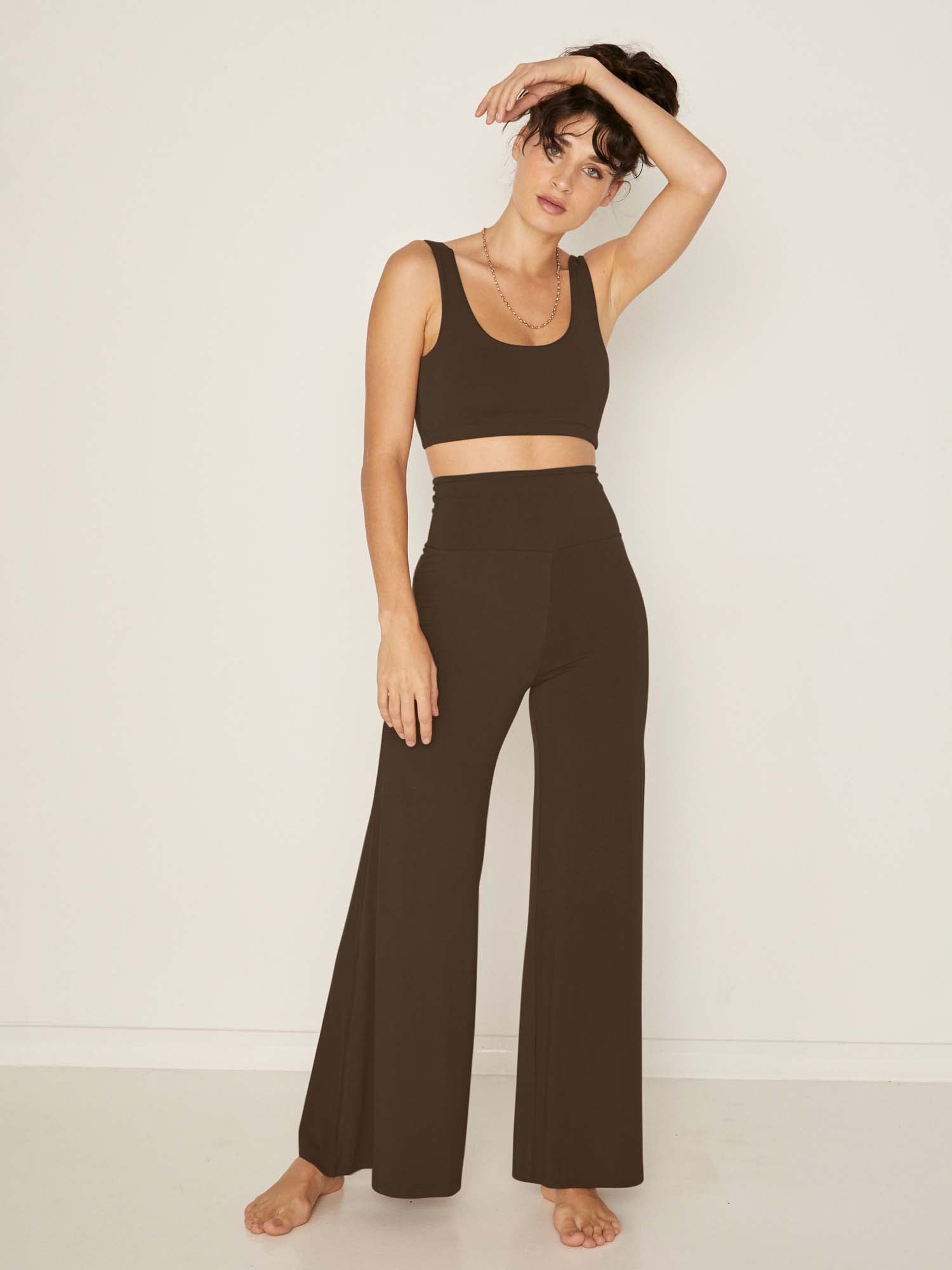 Model wearing cocoa reversible bra, high or low scoop neckline and wide shoulder straps, wireless bra, women's bamboo underwear