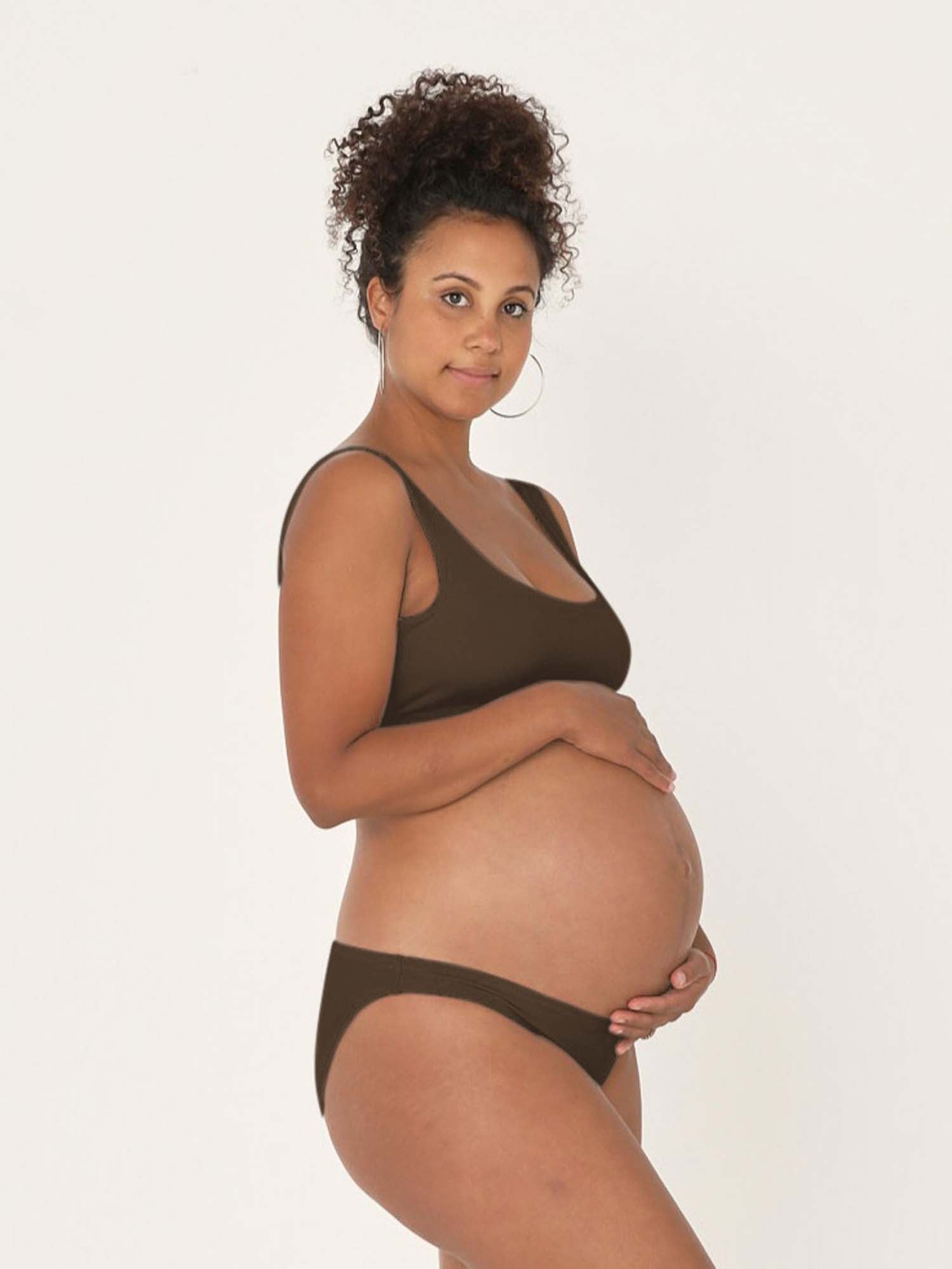 Model wearing cocoa reversible bra, high or low scoop neckline and wide shoulder straps, wireless bra, women's bamboo underwear