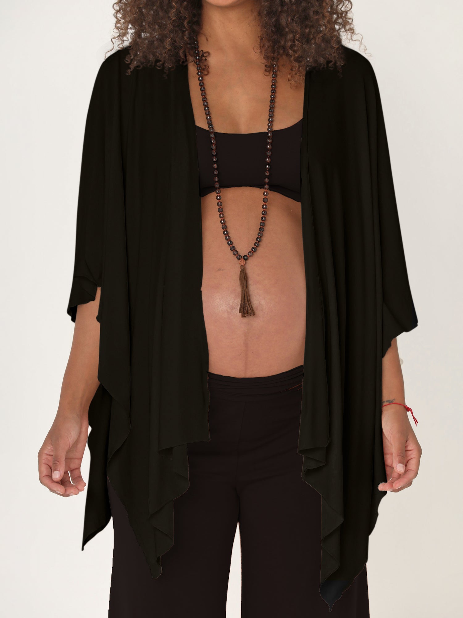 Model wearing black large shawl, nourishing wrap, women's bamboo clothing