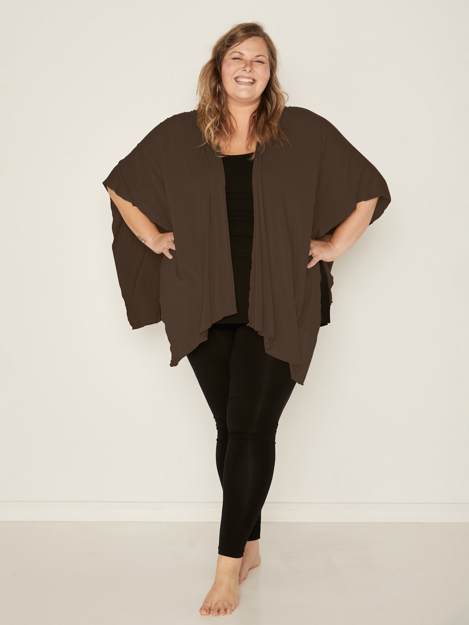 Model wearing cocoa brown large nourishing wrap, women's bamboo clothing