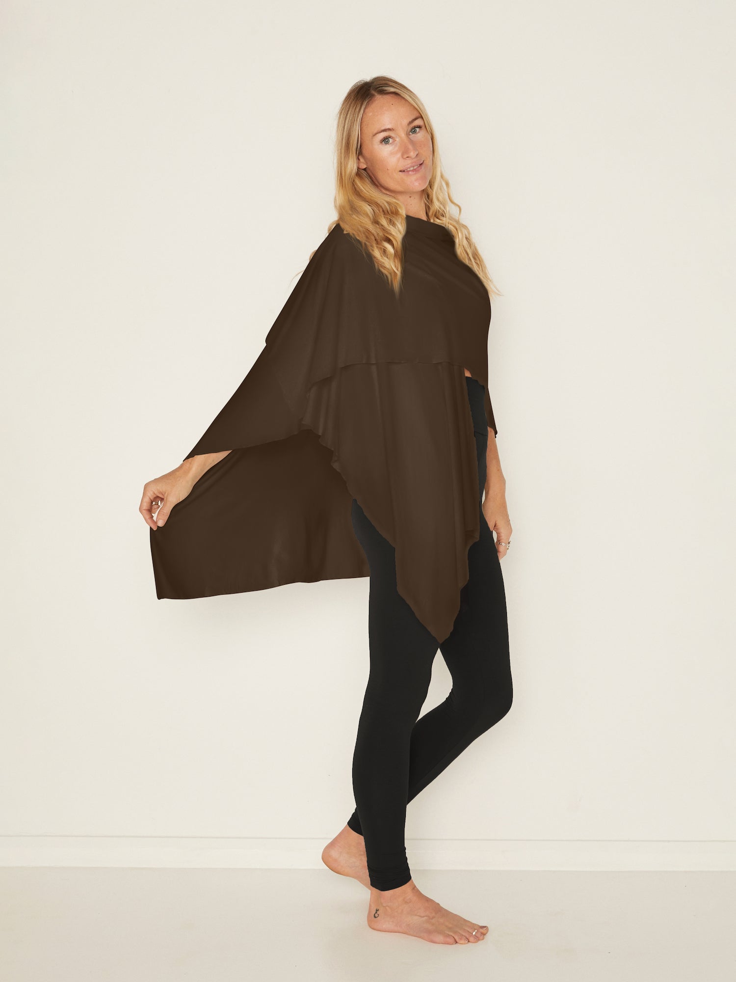 Model wearing black long ankle length tights, double layered high waistband, women's bamboo clothing