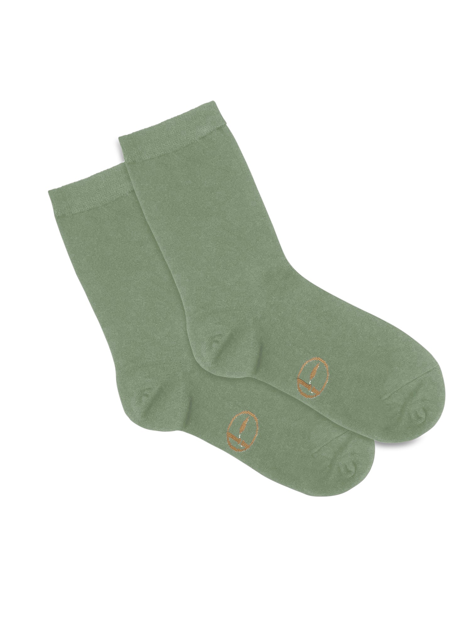 Model wearing eucalyptus green mid rise classic sock with ribbed top and cushioned sole, business & everyday sock, bamboo socks