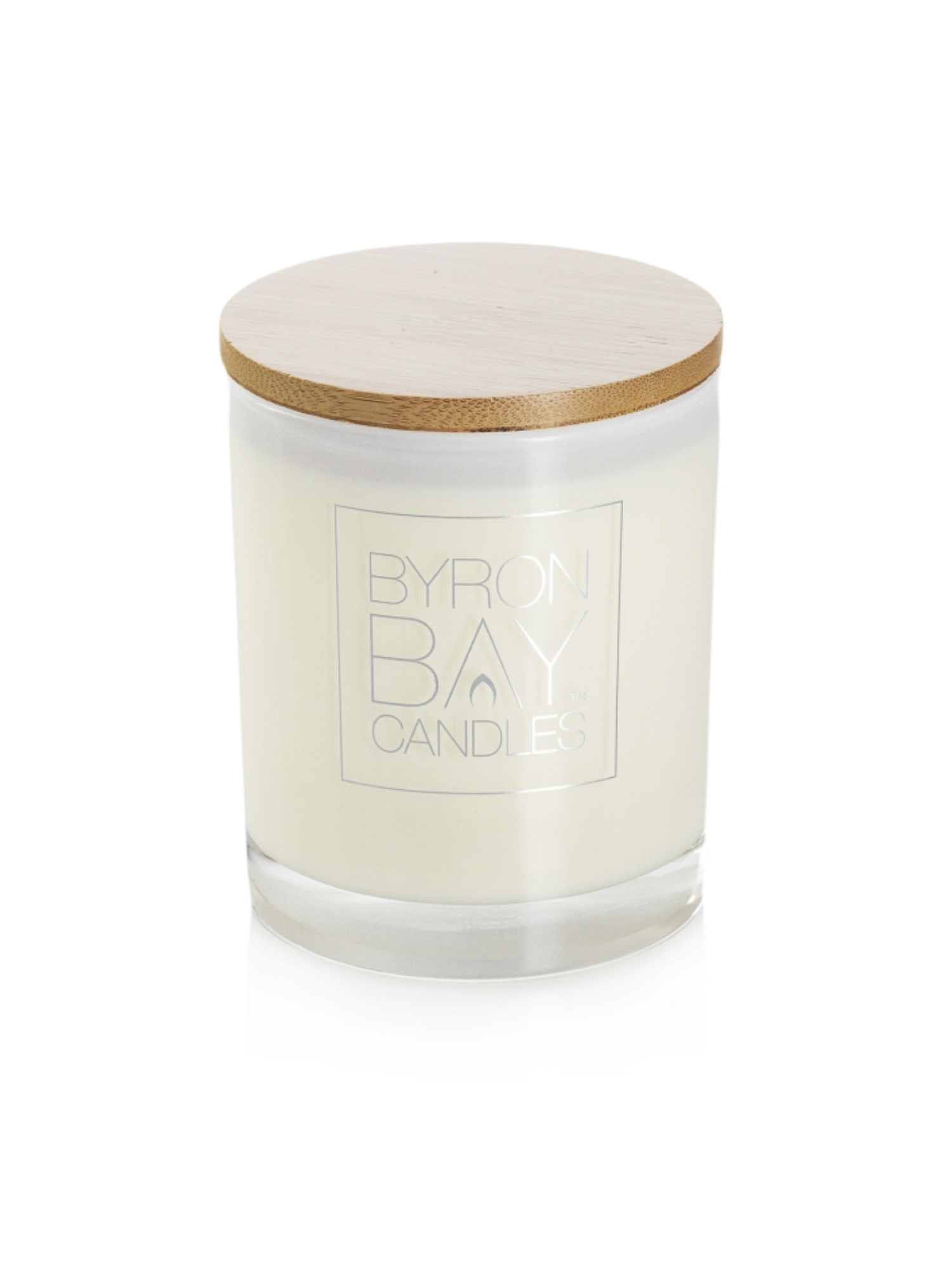 Candle with a wooden lid on a white background, branded 'Byron Bay Candles'.