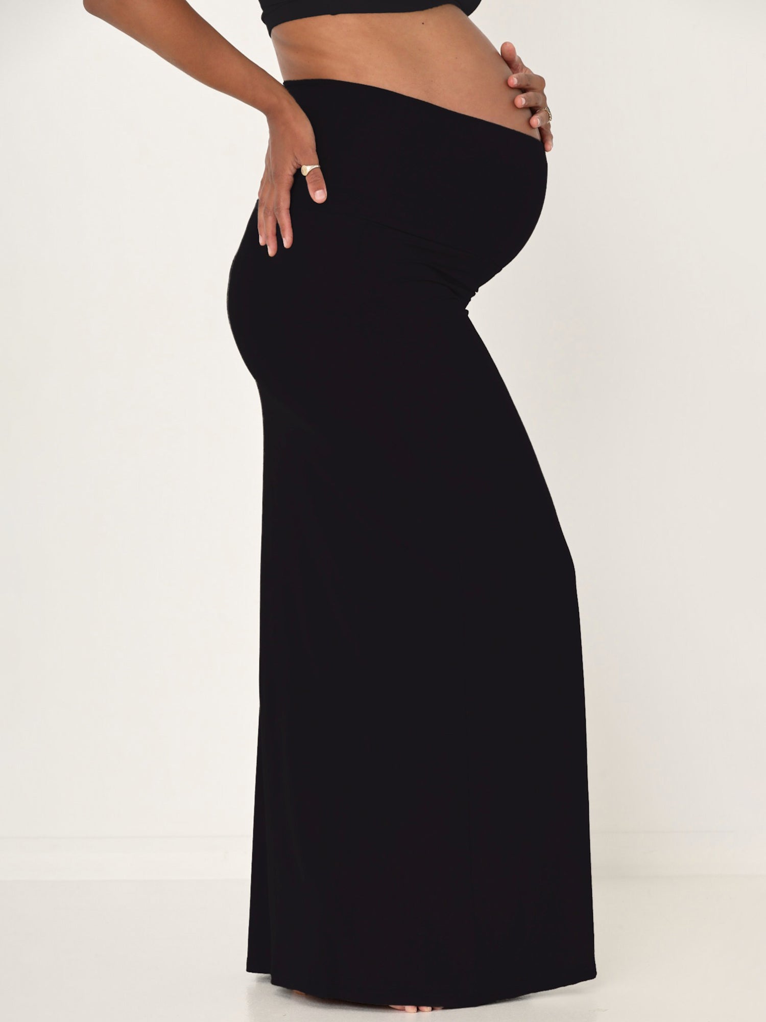 model wearing a long black maxi length skirt, women's bamboo clothing