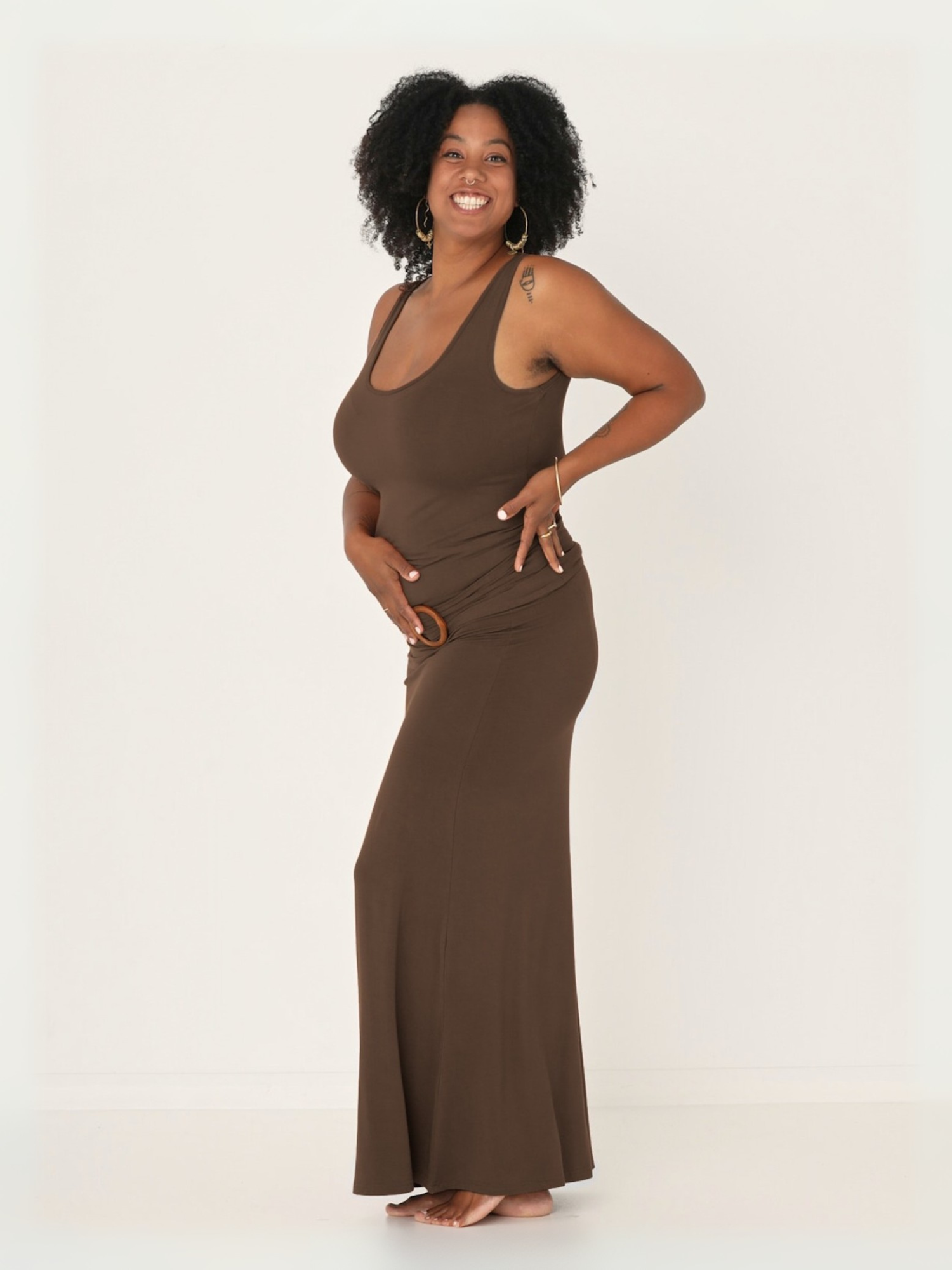 model wearing a long cocoa brown maxi length skirt with matching singlet and belt, women's bamboo clothing