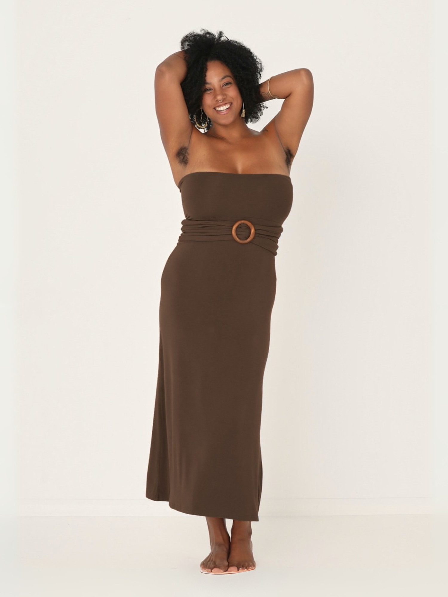 model wearing a long cocoa brown maxi length skirt, worn as a strapless dress, women's bamboo clothing