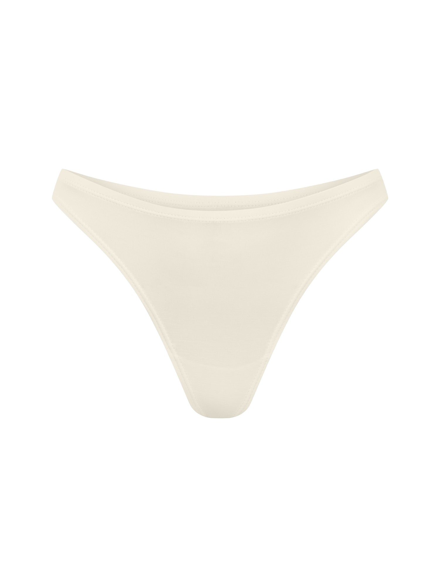 Bamboo cream classic thong g-string underpants on a white background