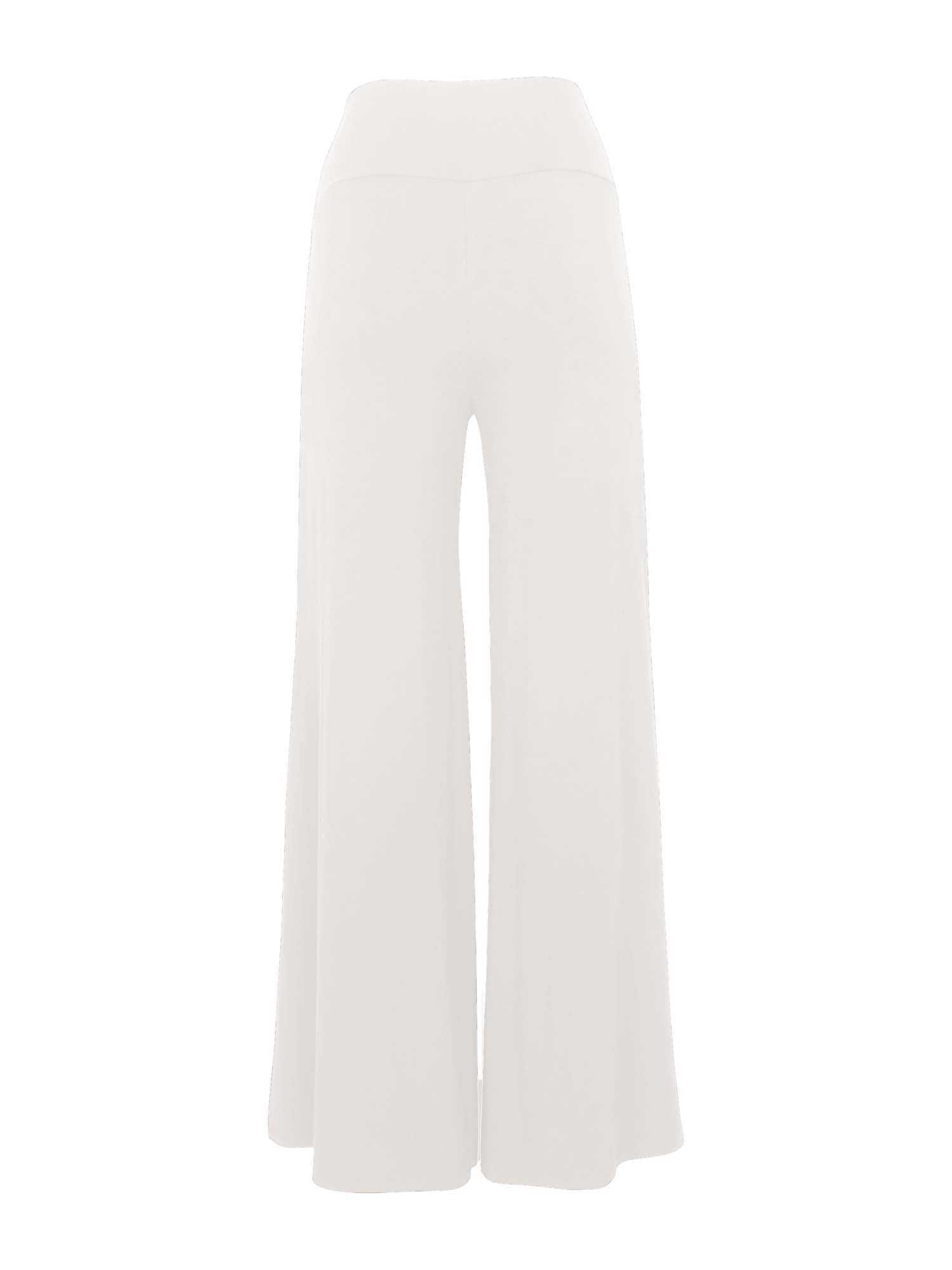 Model wearing cream full length palazzo pants, fitted waist and hips with flowing wide leg, adjustible high waistband, women's bamboo clothing