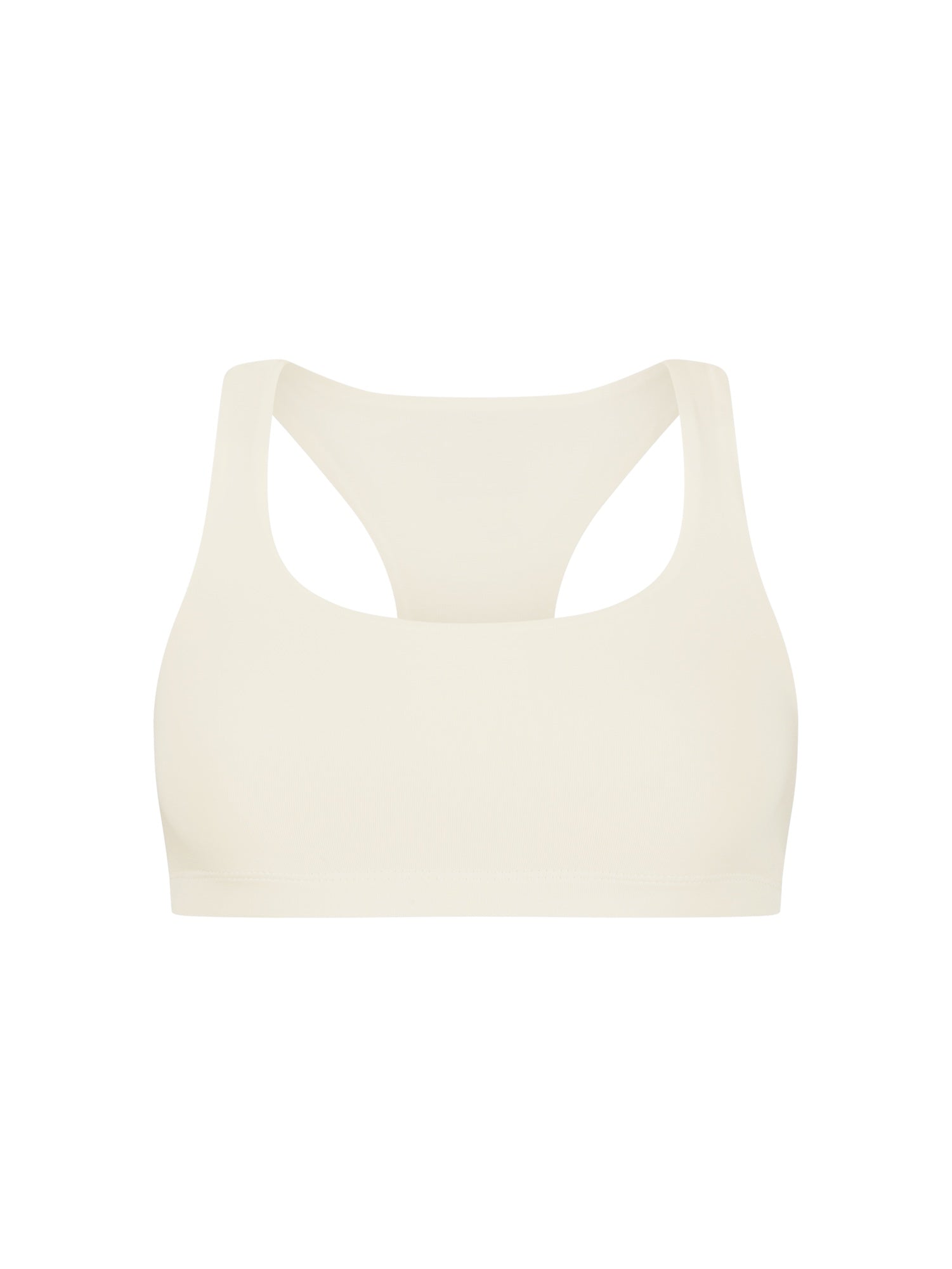 Cream sports bra on a white background