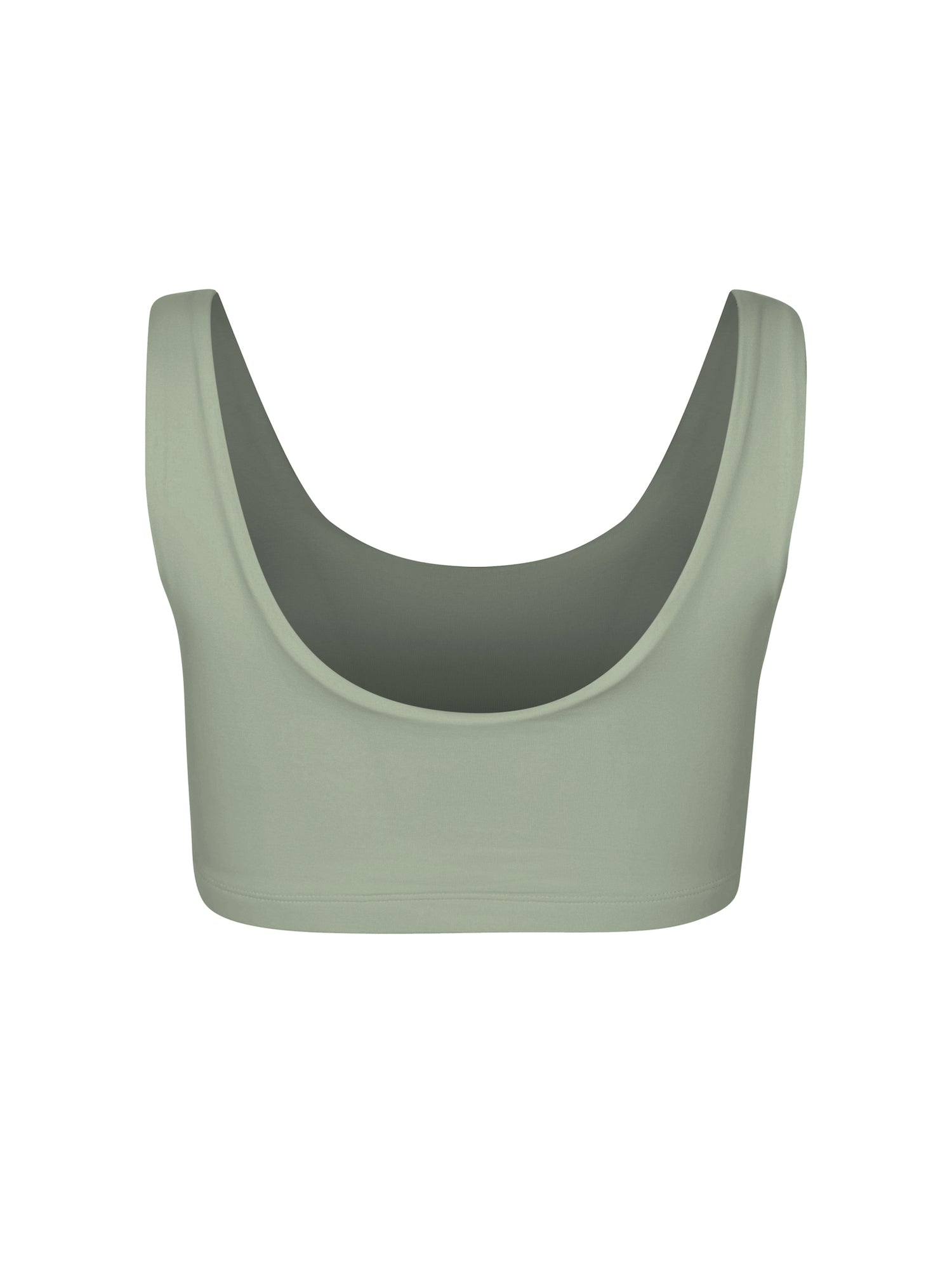 Model wearing eucalyptus green reversible bra, high or low scoop neckline and wide shoulder straps, wireless bra, women's bamboo underwear