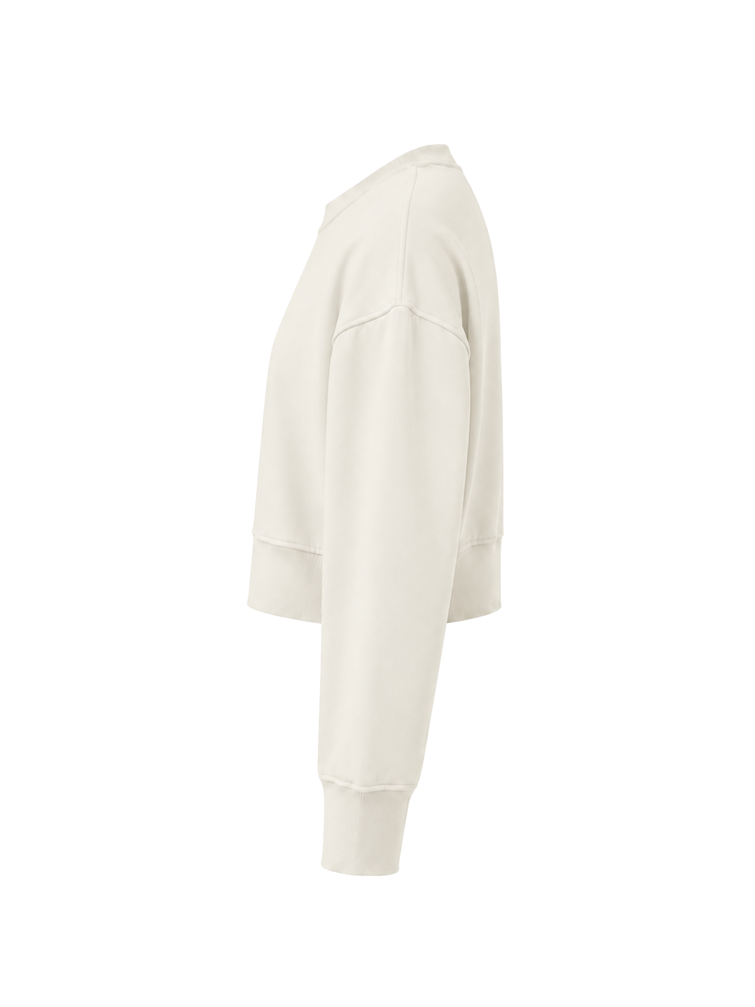 A cropped long-sleeve sweatshirt in a warm off-white or cream color, shown from a side profile view against a plain white background.